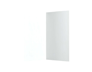 Naklejka premium Simple white paper brochure, open and slightly angled, against a stark black backdrop