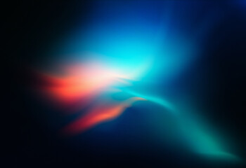 Grainy textured background with a smooth color gradient from dark blue to light blue, with orange and green accents. Abstract and blurry.