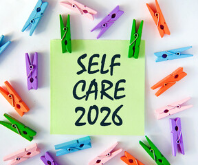 Self care 2026 concept. Wooden cubes on a background