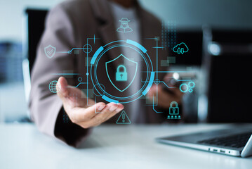 Man holding smartphone with holographic lock and data network graphics. Concept of cybersecurity, privacy, mobile protection