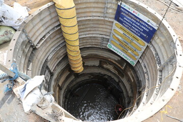 project work on the highway for drilling in the ground, installing large pipes, culverts