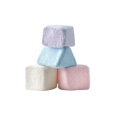 Stacked pastel-colored square candies on a black background, forming a pyramid shape