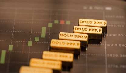 Gold Bars and Financial Chart &mdash; Investment and Market Price Concept	