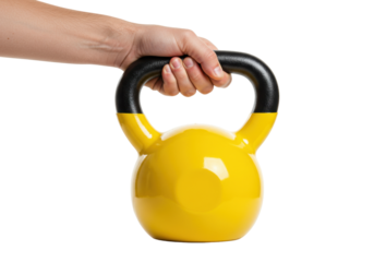 Isolated yellow kettlebell weight held in hand for arm exercise and strength training