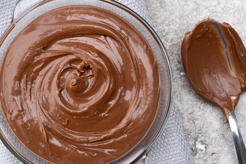 Cream chocolate in a bowl on a vintage background
