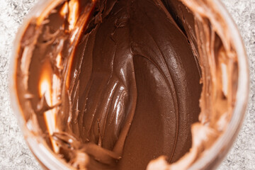 Cream chocolate in a bowl on a vintage background
