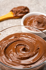 Cream chocolate in a bowl on a vintage background
