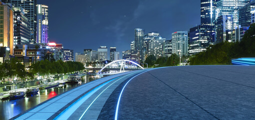 3d rendering futuristic rooftop overlooking a vibrant city skyline at night