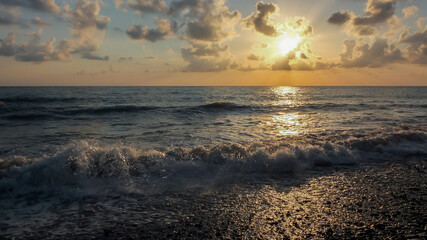 A beautiful sunset at sea. Landscape of a red sunset at sea.