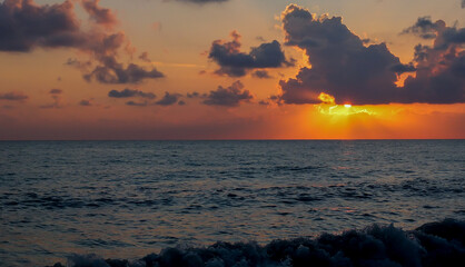 A beautiful sunset at sea. Landscape of a red sunset at sea.
