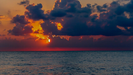 A beautiful sunset at sea. Landscape of a red sunset at sea.