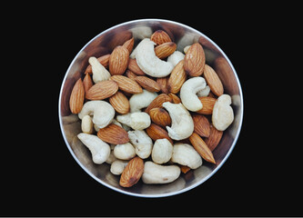Top-Down View of Mixed Almonds and Cashews in a Bowl