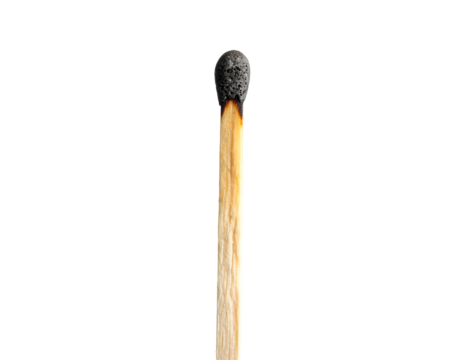 A single, partially burned wooden match against a stark, black background