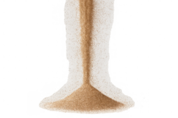 Sand pouring down, forming pile on transparent background, symbolizing time passing or duration