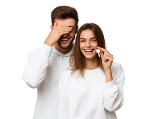 Excited Young Couple Celebrating New Home Ownership Holding Up the Key isolated on a transparent background
