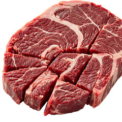 a close-up studio shot of raw, marbled beef chuck roast, partially sliced into steak-like portions against a white background.