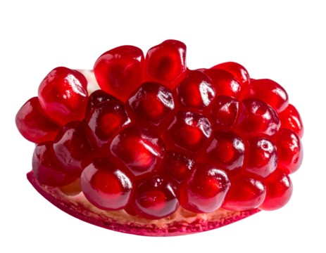 A close-up of a partially opened fruit revealing jewel-toned, edible seeds