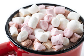 Hot chocolate drink with marshmallows in red mug isolated on white background. Close up