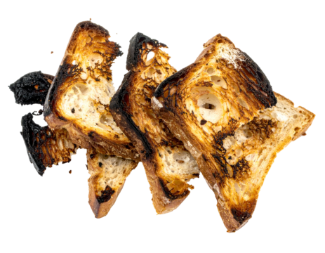 Pile of sliced, heavily toasted bread with burnt edges on a transparent background