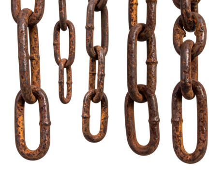 Several rusty metal chains hang against a black background