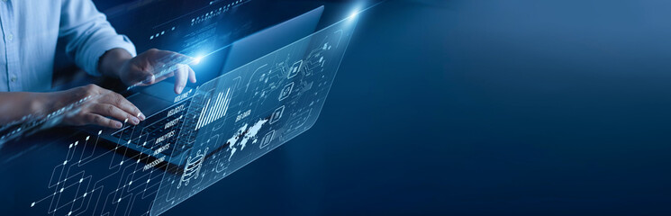 Big Data network connection concept. Data analyst hand working on a laptop computer with graphical...