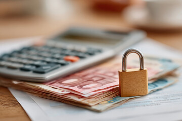 Financial security with calculator and locked cash
