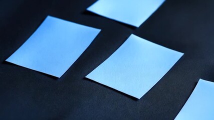 A collection of colorful sticky notes sitting on a table, ideal for planners and organizers