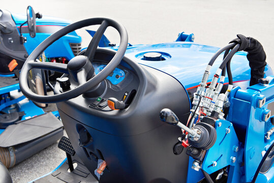 Tractor steering wheel and dashboard