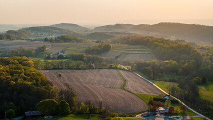 Aerial landscape of corn fields farmland mountains sunset rural Appalachia Central Pennsylvania © Andrew