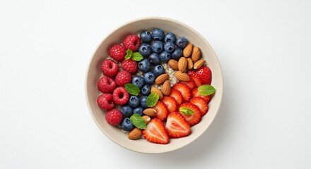 Overhead bowl with berries, almonds, and chia seeds