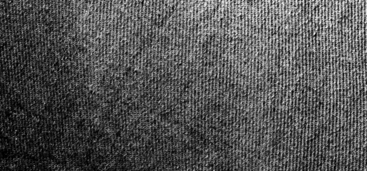 High-detail dark knitted wool fabric texture with transparency.