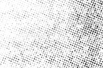 Distressed halftone dot pattern with grunge texture, isolated on a transparent background.