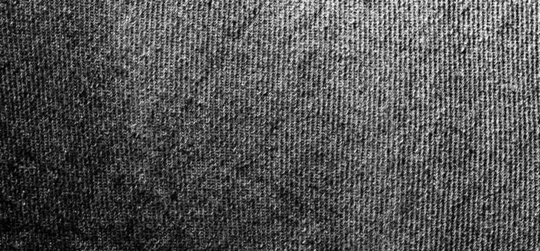 High-detail dark knitted wool fabric texture with transparency.