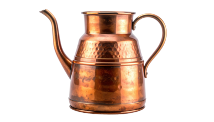 Gleaming copper pitcher with curved spout and handle, a rustic yet elegant vessel on a dark background