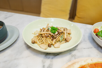 Delicious mushroom pasta dish on a plate, ready to be enjoyed