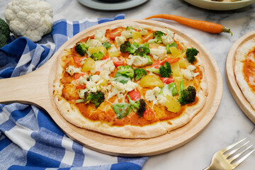 A Delicious and Healthy Pizza with Fresh Vegetables