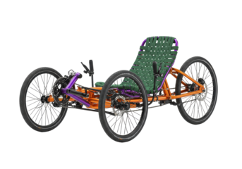 Isolated recumbent tricycle featuring a three-wheel design, green seat and purple frame tubes