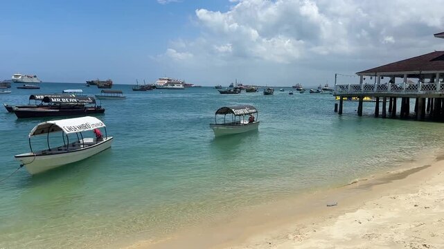 Boats Stone town zanzibar city tanzania beach indian ocean palm trees