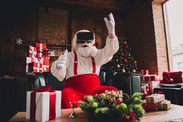 Virtual Santa plays high tech helper learning holiday joy at a cozy Christmas home with gifts under...