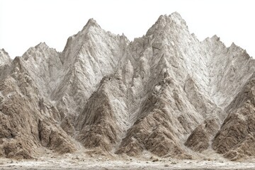 Dramatic Landscape of Jagged Mountain Peaks Against a White Sky in a Desert Environment Natural Light