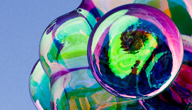 Colorful bouncy bubbles against blue background