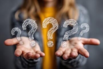 Woman holding out hands with glowing question marks floating above them symbol