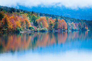 Lake Bohinj bathed in autumn magic. The kingdom of the golden-horned ibex.