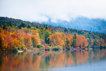 Lake Bohinj bathed in autumn magic. The kingdom of the golden-horned ibex.