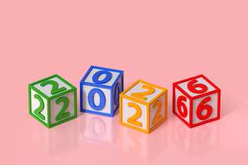 Colorful cubes showing year 2026 on pink background
