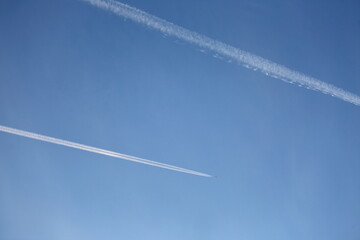 plane in the blue sky
