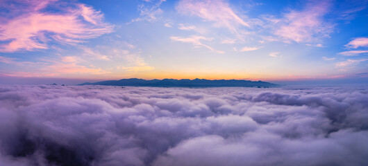 Beautiful sea of clouds and mountain scenery with a dramatic sky at sunrise