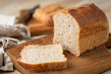 Sourdough whole wheat bread loaf cut in slices