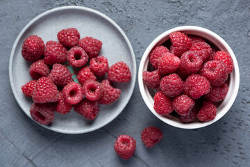 Raspberries in bowl. Healthy fresh summer berry harvest