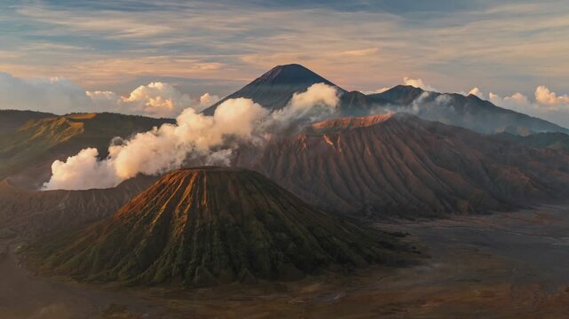 Explore the breathtaking beauty of Bromo volcano in Indonesia, showcasing its stunning landscape, cloud formations, and vibrant colors during sunrise. Time lapse